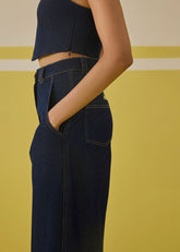 A Model Wearing Organic Cotton Denim The Daisy Denim Trousers, curated by Only Ethikal